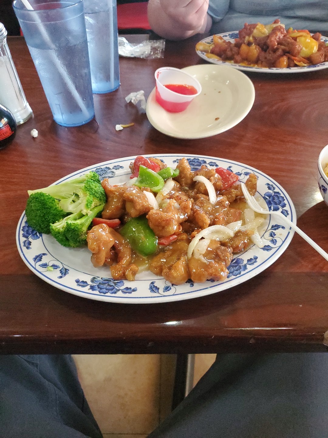 Sweet and sour chicken with peppers and onions